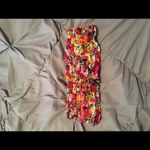 Floral bathing suit top, orange bottoms